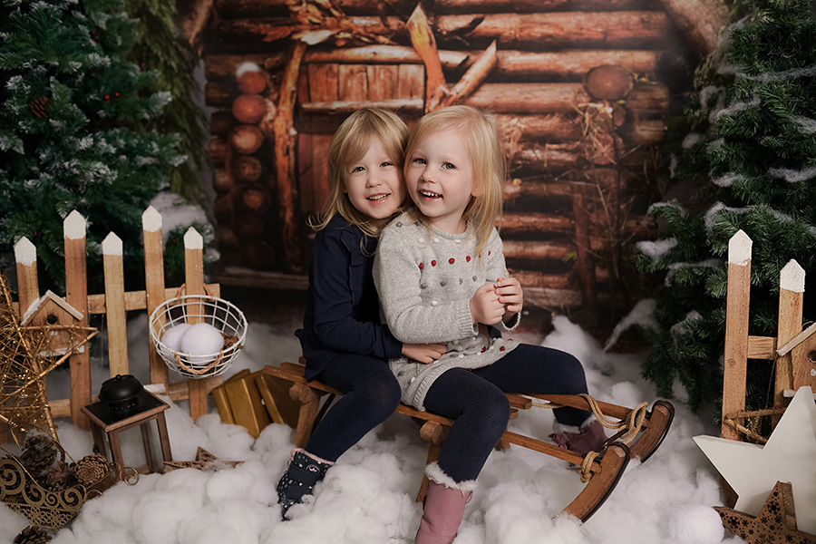 Kinder Weihnachtsfotografie mit der Kinder und Familie in Fotostudio München